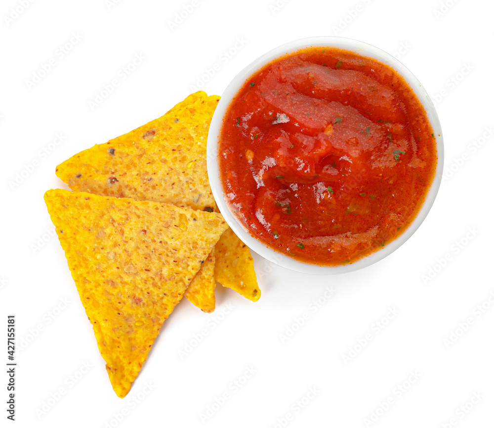 Bowl of tasty salsa sauce with nachos on white background Bowl of tasty salsa sauce with nachos on white background