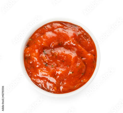 Bowl of tasty salsa sauce on white background photo