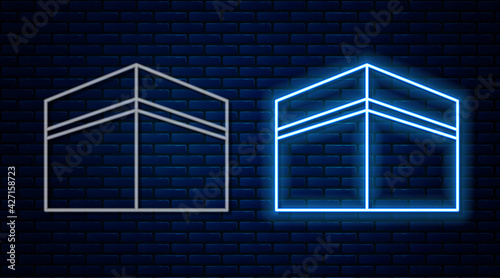 Glowing neon line Kaaba mosque icon isolated on brick wall background. Kaaba hajj Mecca pray pilgrimage Ramadan Islam muslim mosque. Vector