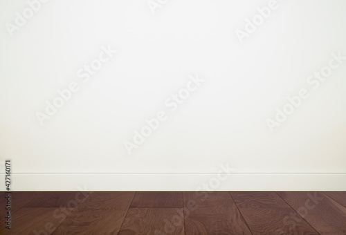 Empty room interior with white wall background and wooden floor. Home plant in a light empty room