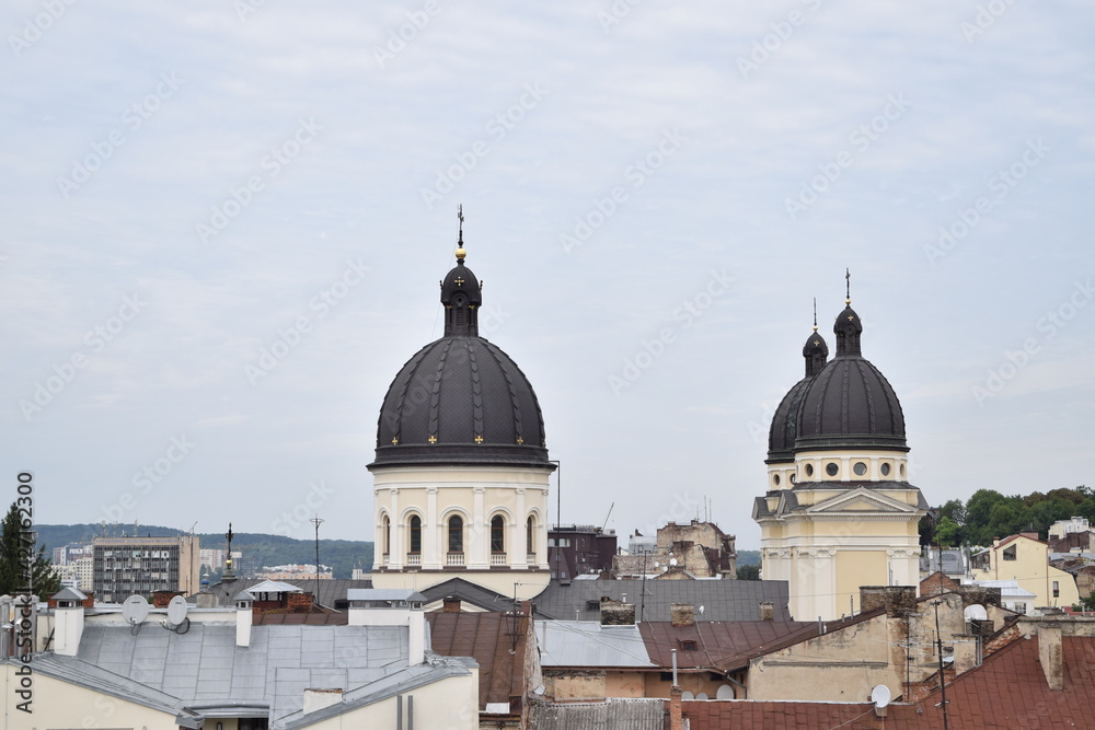 view of the roofs and the church in the center of Lviv 