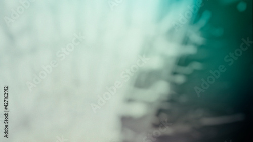 abstract pattern of interwoven thin structures on a background of striped curved erhnosti monochrome, 3d render, blurry image