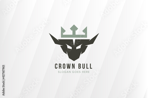 combination between buffalo and crown for logo design template. Angry bull face symbol. flat colors.