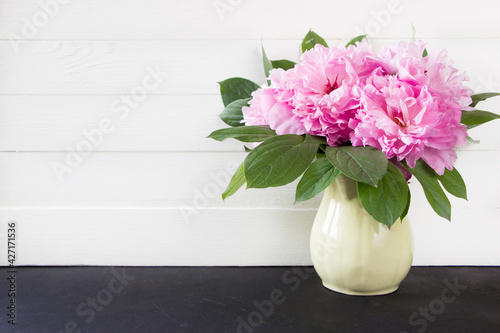 Fototapeta Naklejka Na Ścianę i Meble -  Pink peony flowers bouquet on white background with copy space. Mother's day, 8 march, women's day or wedding concept. Spring flowers background