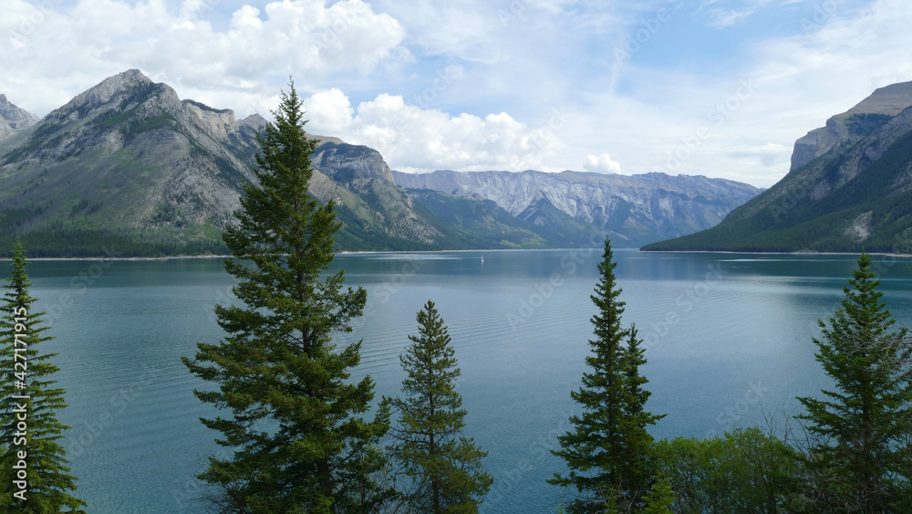 Lake Minnewanka scenic drive, popular tourist place in Rocky Mountains near Banff, Alberta, Canada