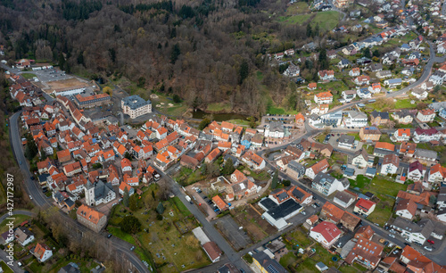 Aerial view of the city Wächtersbach in Germany, Hesse on a sunny early spring day