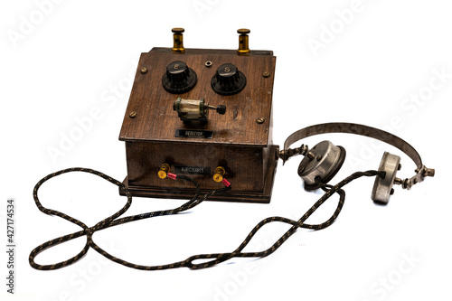 old wooden crystal radio on white background