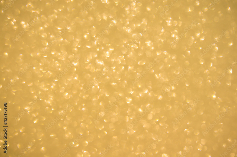 Gold glitters background. shimmering blur spot lights Bokeh Shiny gold light background. Gold glitters background. shimmering blur spot lights Bokeh Shiny gold light background.