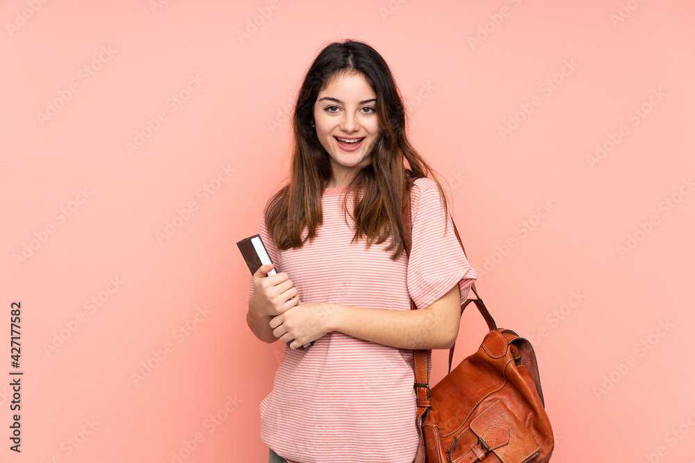 Young student woman going to the university over isolated pink background with surprise facial expression Young student woman going to the university over isolated pink background with surprise facial expression