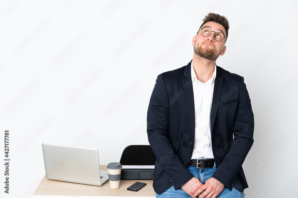 Russian man in a office isolated on white background and looking up Russian man in a office isolated on white background and looking up
