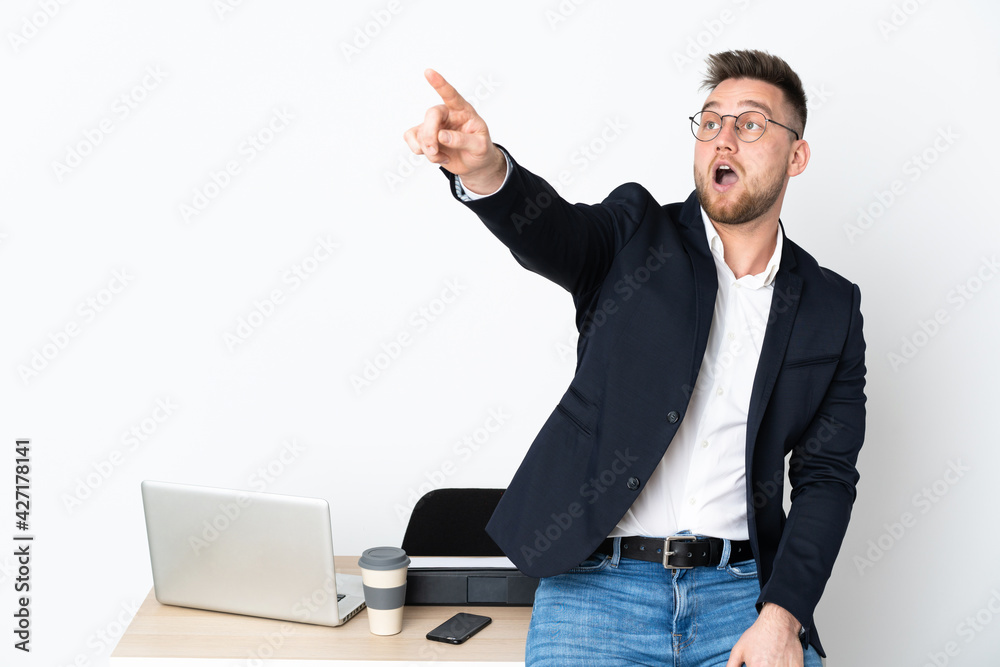 Russian man in a office isolated on white background pointing away Russian man in a office isolated on white background pointing away