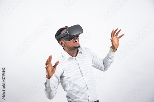 young nigerian man using a virtual reality head set