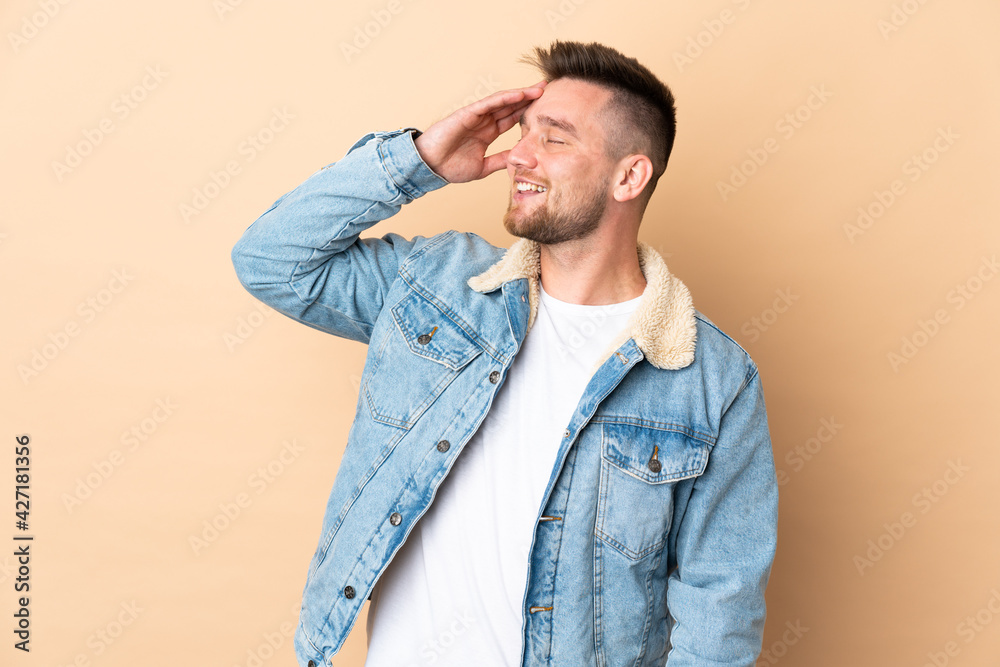 Russian handsome man over isolated background smiling a lot Russian handsome man over isolated background smiling a lot