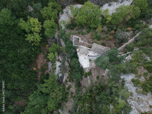 ioannina greece, ancient stone architecture monastery of panagia raidiotissa of vrosina village in zalogitiko gorge mountains built in byzantine period 1628 