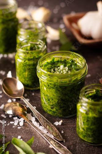 Fresh homemade wild garlic pesto in glass jar
