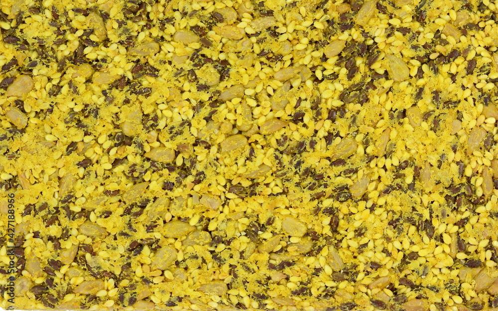 Whole grains turmeric bread sticks texture. Fresh integral salted sticks biscuit.