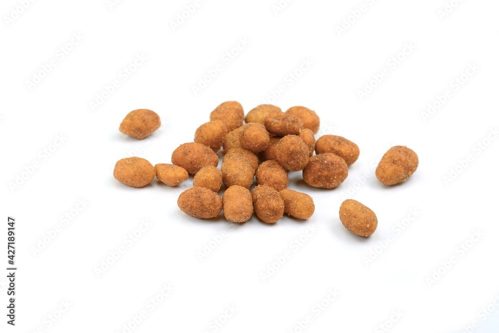 Crispy peanut isolated on white background. Coated peanuts isolated. Crispy peanut isolated on white background. Coated peanuts isolated.