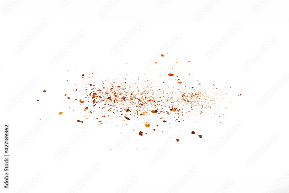 Red Hot Cayenne pepper isolated. Pile crushed red cayenne pepper, dried chili flakes and seeds isolated on white background