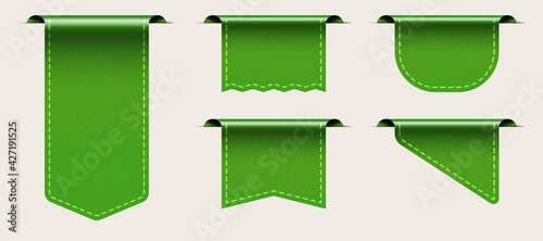 Green tag fabric label template with empty copy space set. Realistic three-dimensional ribbon with stitch frame, blank space for promo text advertising message vector illustration isolated on white