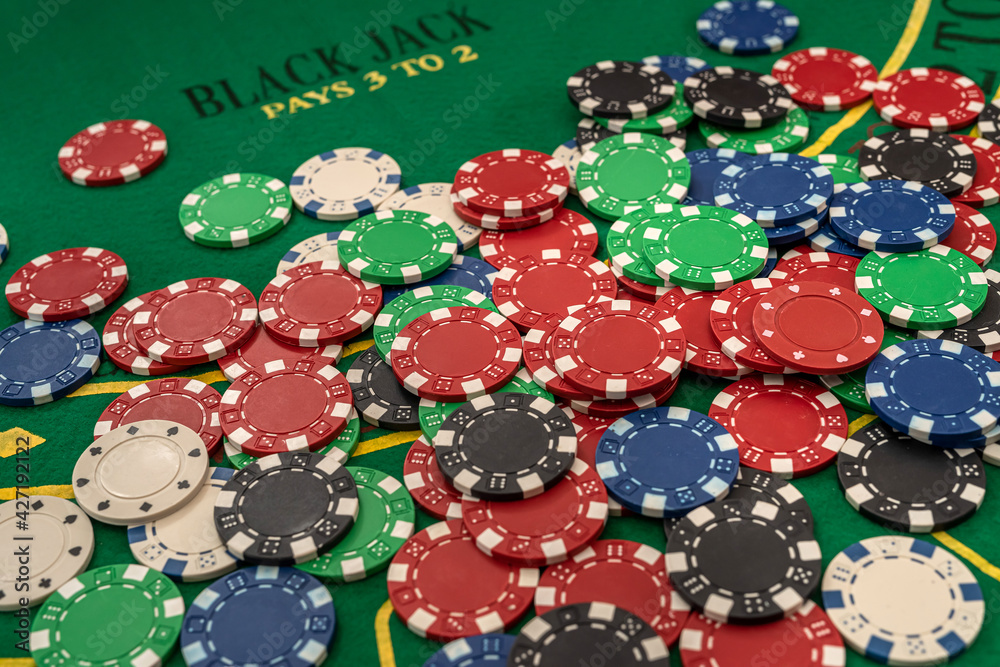 Stack of poker chips on a casino table Stack of poker chips on a casino table