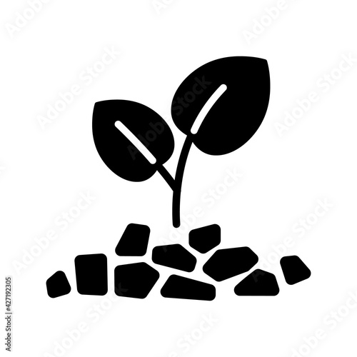 Mulch black glyph icon. Layer of material applied to the surface of soil. Improving fertility and health of soil to grow plants. Silhouette symbol on white space. Vector isolated illustration
