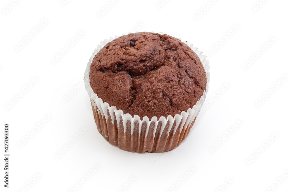 Sweet chocolate muffin in paper cup on a white background