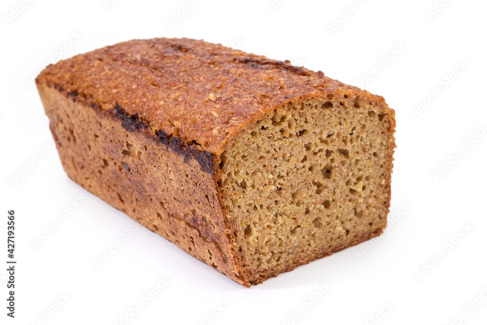 Rectangular loaf of whole wheat bread close-up, selective focus Rectangular loaf of whole wheat bread close-up, selective focus