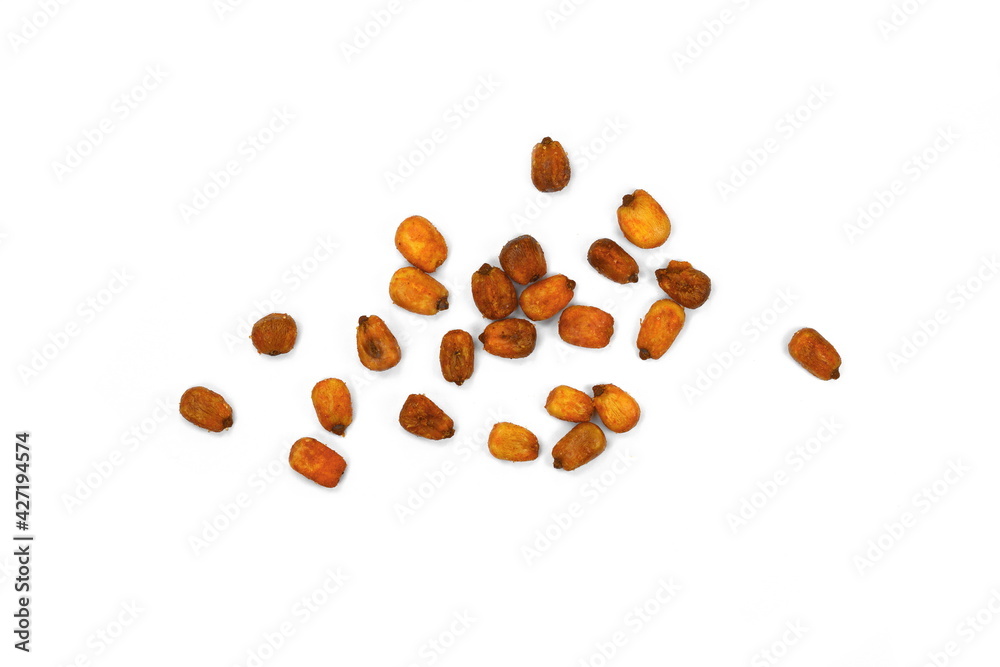 Pile of toasted salted corn on a white background. Salted roasted corn with chili pepper. Pile of toasted salted corn on a white background. Salted roasted corn with chili pepper.