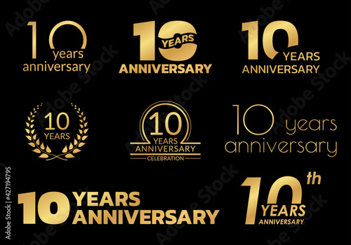 10 years anniversary icon or logo set. 10th birthday celebration golden badge or label for invitation card, jubilee design. Vector illustration.