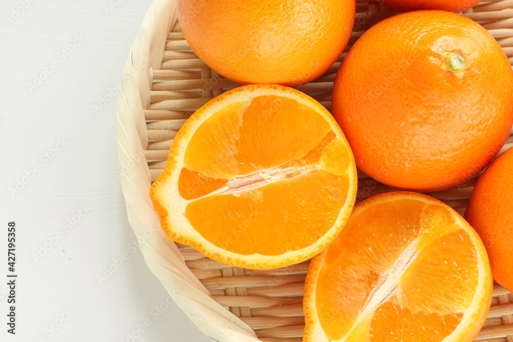 freshness orange on bamboo basket from America freshness orange on bamboo basket from America