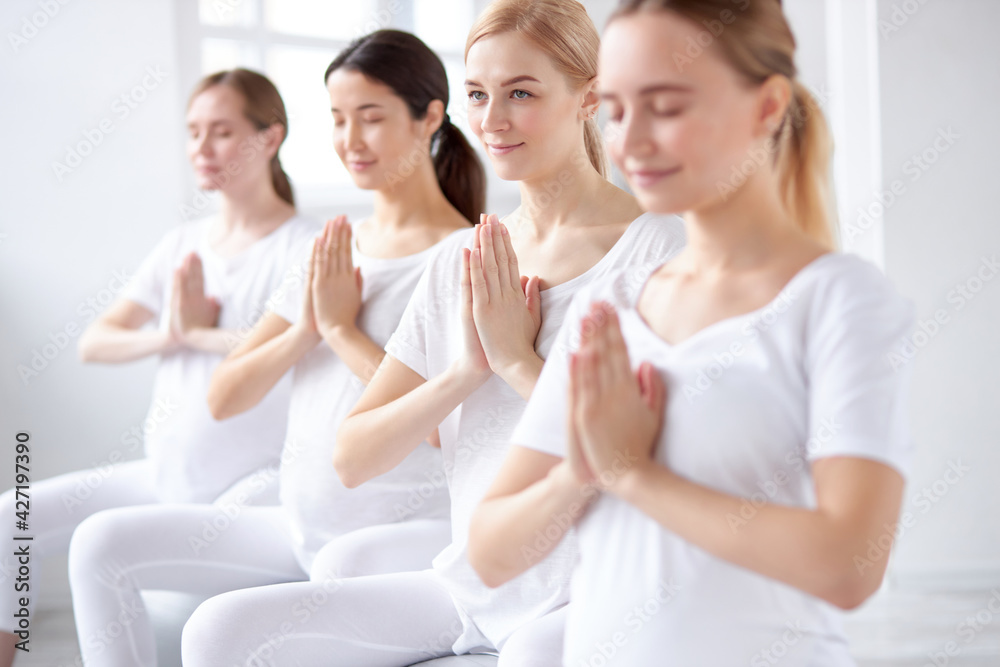 Gravid Women Sitting on Fitball In Yoga Pose, Preparing To Become Mother Gravid Women Sitting on Fitball In Yoga Pose, Preparing To Become Mother