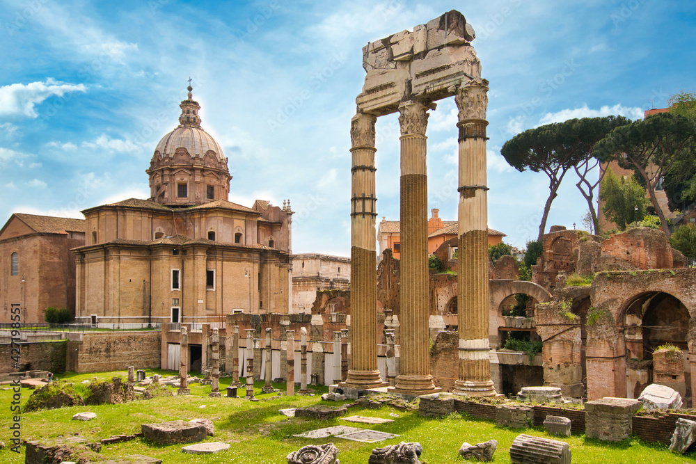 forum romanum in Rome, Italy. Temple of Saturn and Temple of Castor and Pollux, ancient ruins of the Roman Forum. Travel and vacation in Italy