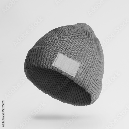 Φωτογραφία Beanie knitted hat in gray with design space