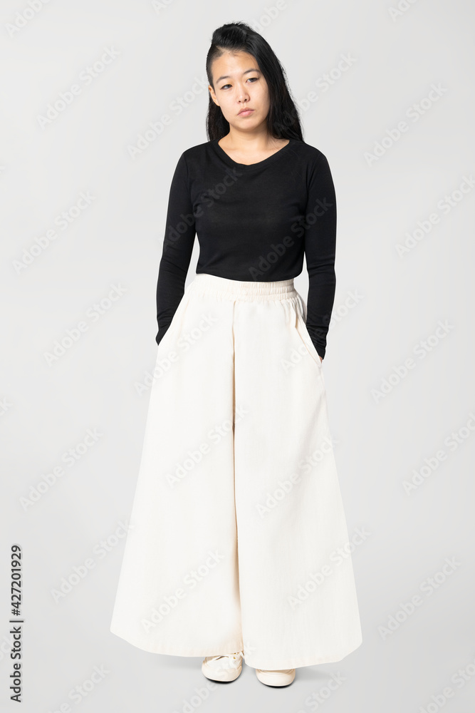 Asian woman in white palazzo pants with design space casual wear fashion full body Asian woman in white palazzo pants with design space casual wear fashion full body