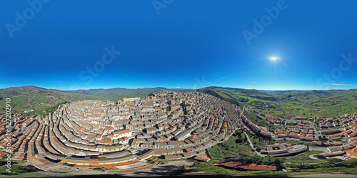 360 degree photo of the typical village of Gangi with a view of the Etna volcano. Typical Sicilian village. Nature on the Madonie in winter. Wheat fields.