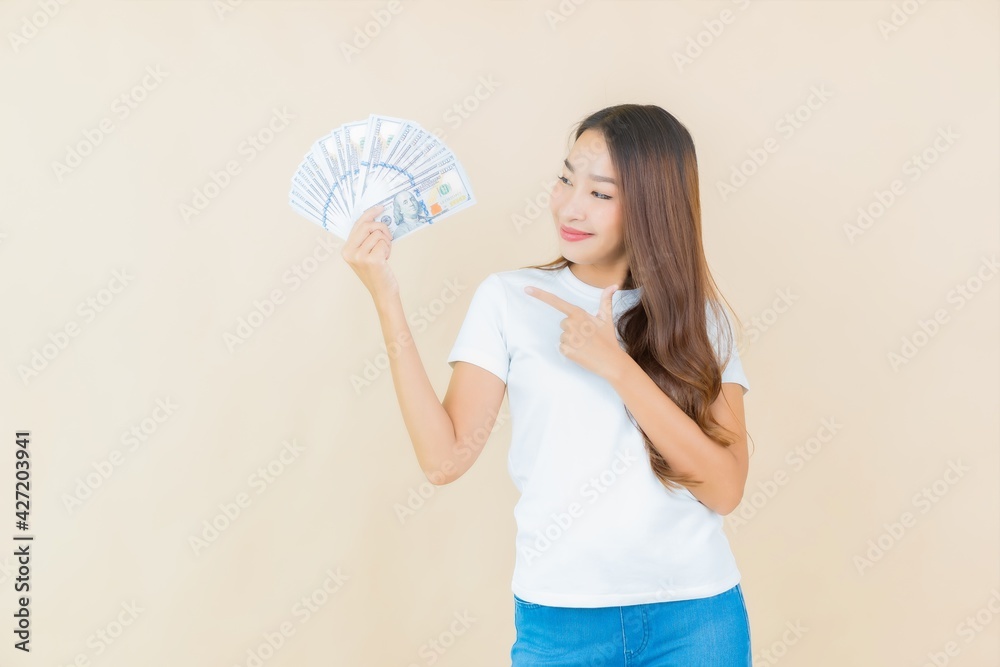 Portrait beautiful young asian woman with a lot of cash and money Portrait beautiful young asian woman with a lot of cash and money