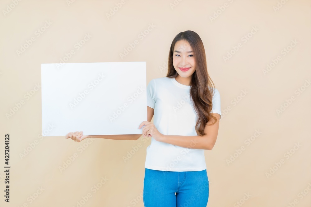 Portrait beautiful young asian woman show empty white billboard card paper Portrait beautiful young asian woman show empty white billboard card paper