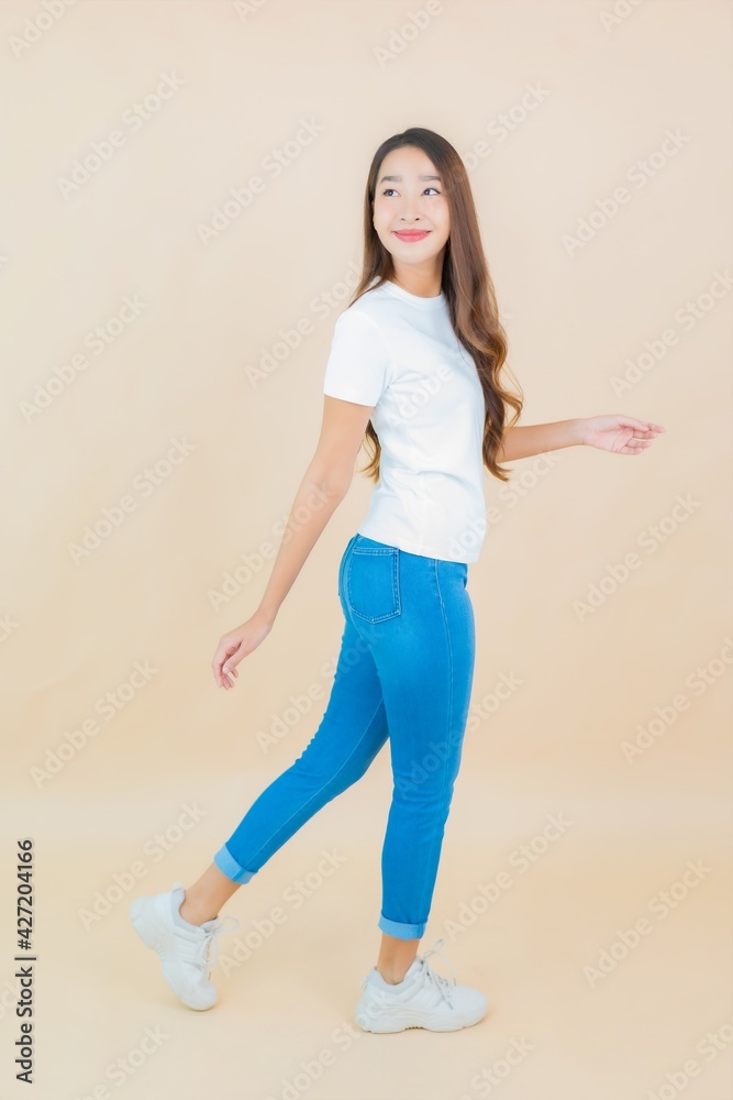 Portrait beautiful young asian woman smile with action Portrait beautiful young asian woman smile with action