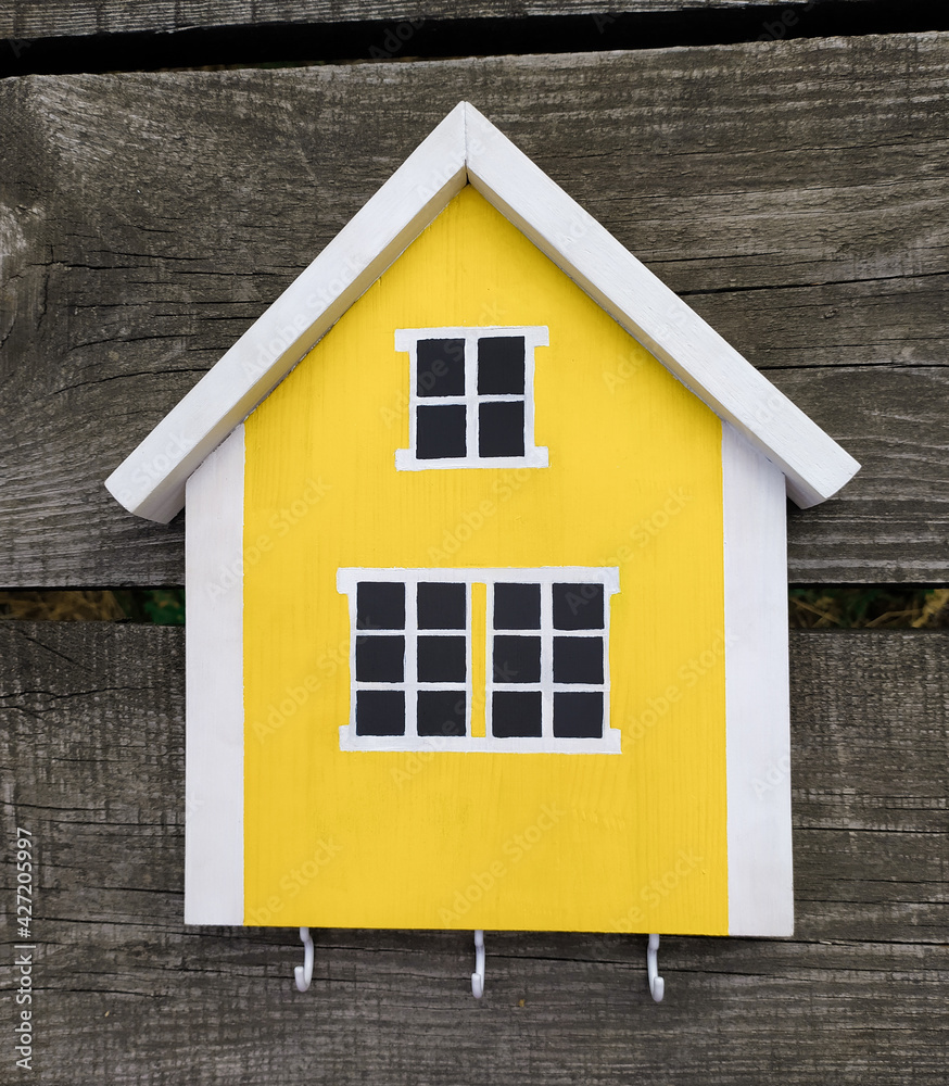Wooden key holder. Scandinavian yellow house Wooden key holder. Scandinavian yellow house
