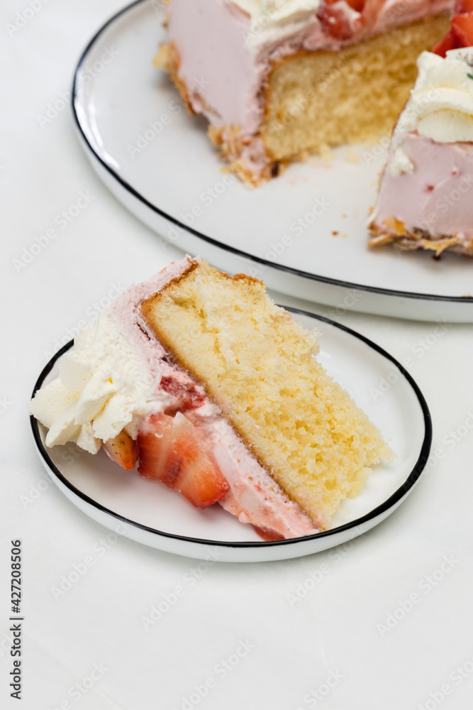 Mothers Day heart cake with whipped cream and strawberry Mothers Day heart cake with whipped cream and strawberry