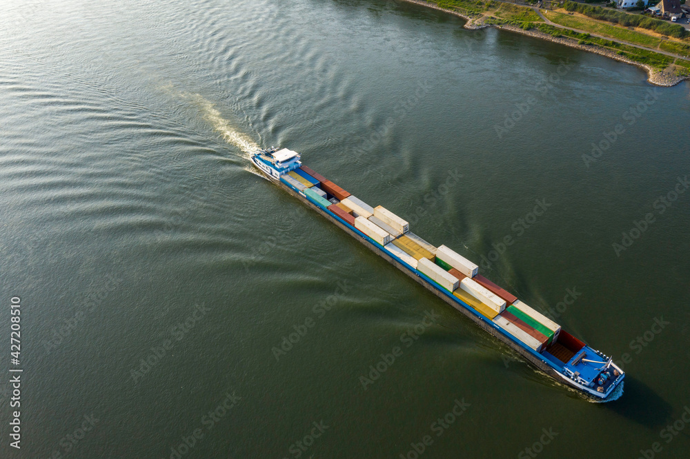 Aerial view from container boat on the Rhine river, Germany