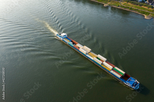 Aerial view from container boat on the Rhine river, Germany