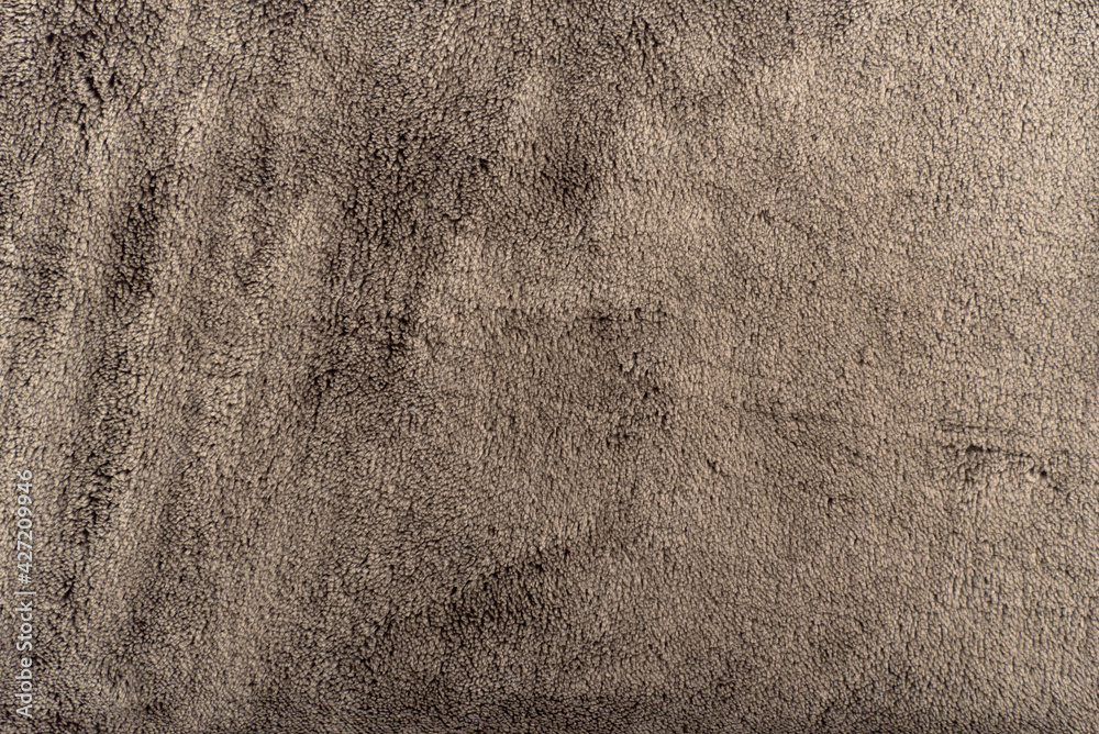 Abstract gray background. Velour, plush or suede. Rough texture. Abstract gray background. Velour, plush or suede. Rough texture.