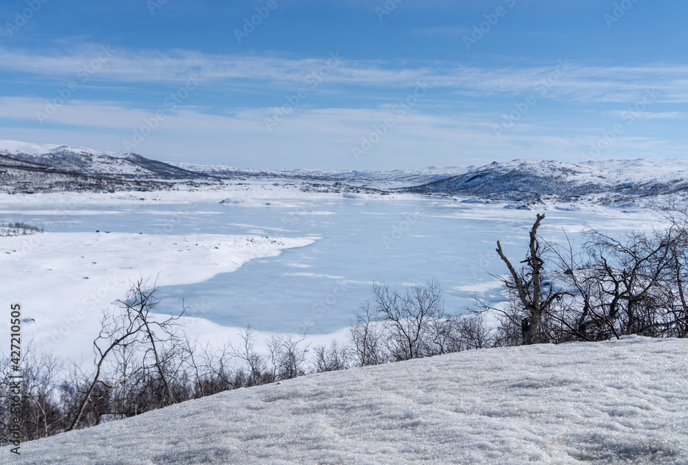View of the frozen lake Sløddfjorden near the village of Haugastøl, in the municipality of Hol, Viken County, Norway View of the frozen lake Sløddfjorden near the village of Haugastøl, in the municipality of Hol, Viken County, Norway