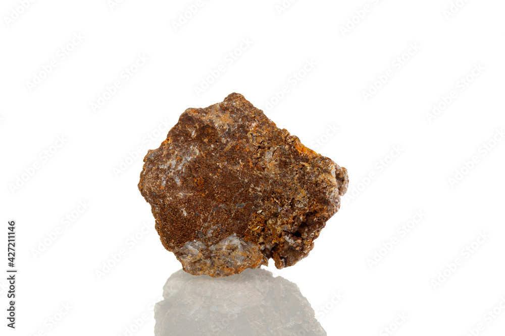 macro mineral stone Wulfenite on a white background macro mineral stone Wulfenite on a white background
