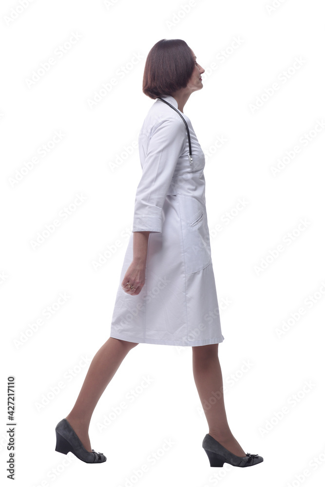 confident experienced doctor goes ahead . isolated on a white background. confident experienced doctor goes ahead . isolated on a white background.