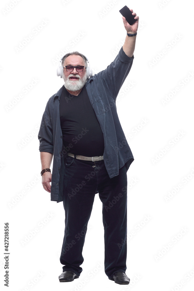 confident bearded man showing his smartphone. in full growth. confident bearded man showing his smartphone. in full growth.