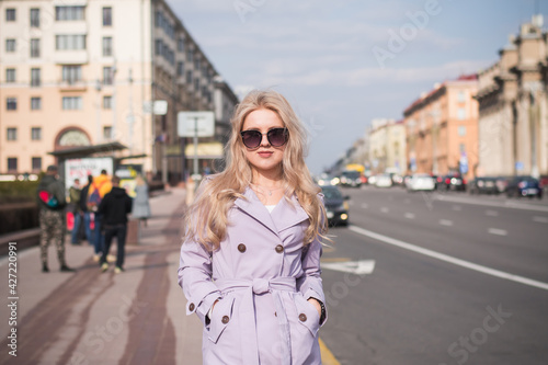 Lifestyle concept, a beautiful girl in the city walks