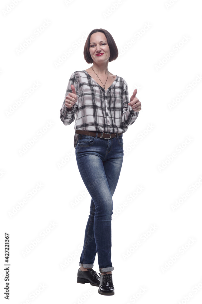 attractive mature woman in jeans showing thumbs up attractive mature woman in jeans showing thumbs up