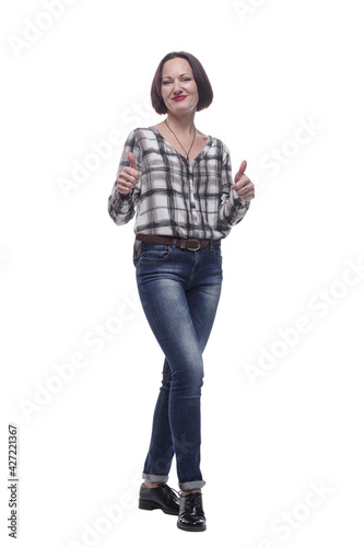 attractive mature woman in jeans showing thumbs up